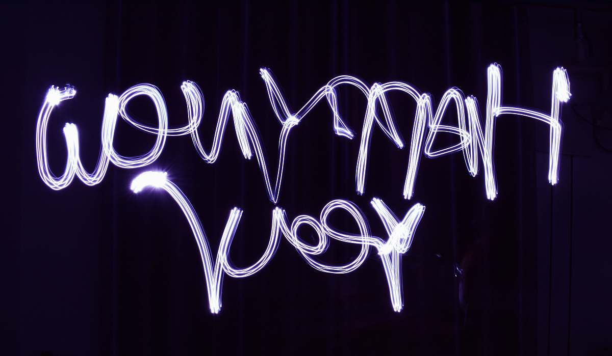 handwriting Happy New Year text calligraphy