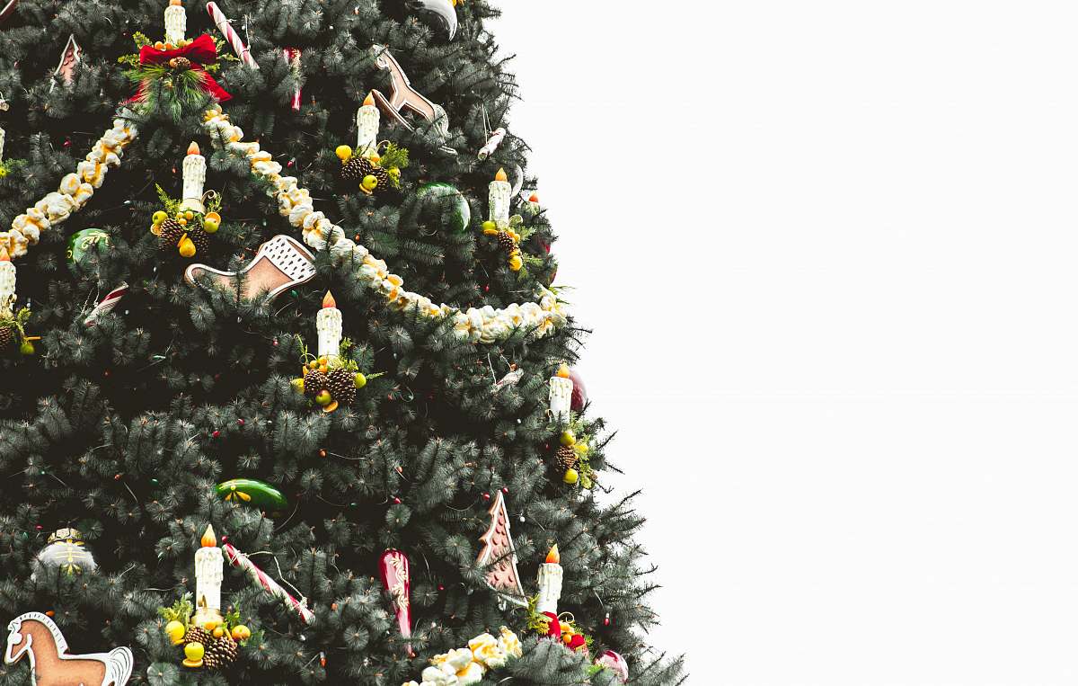 christmas Christmas tree covered with ornaments and tinsels holiday