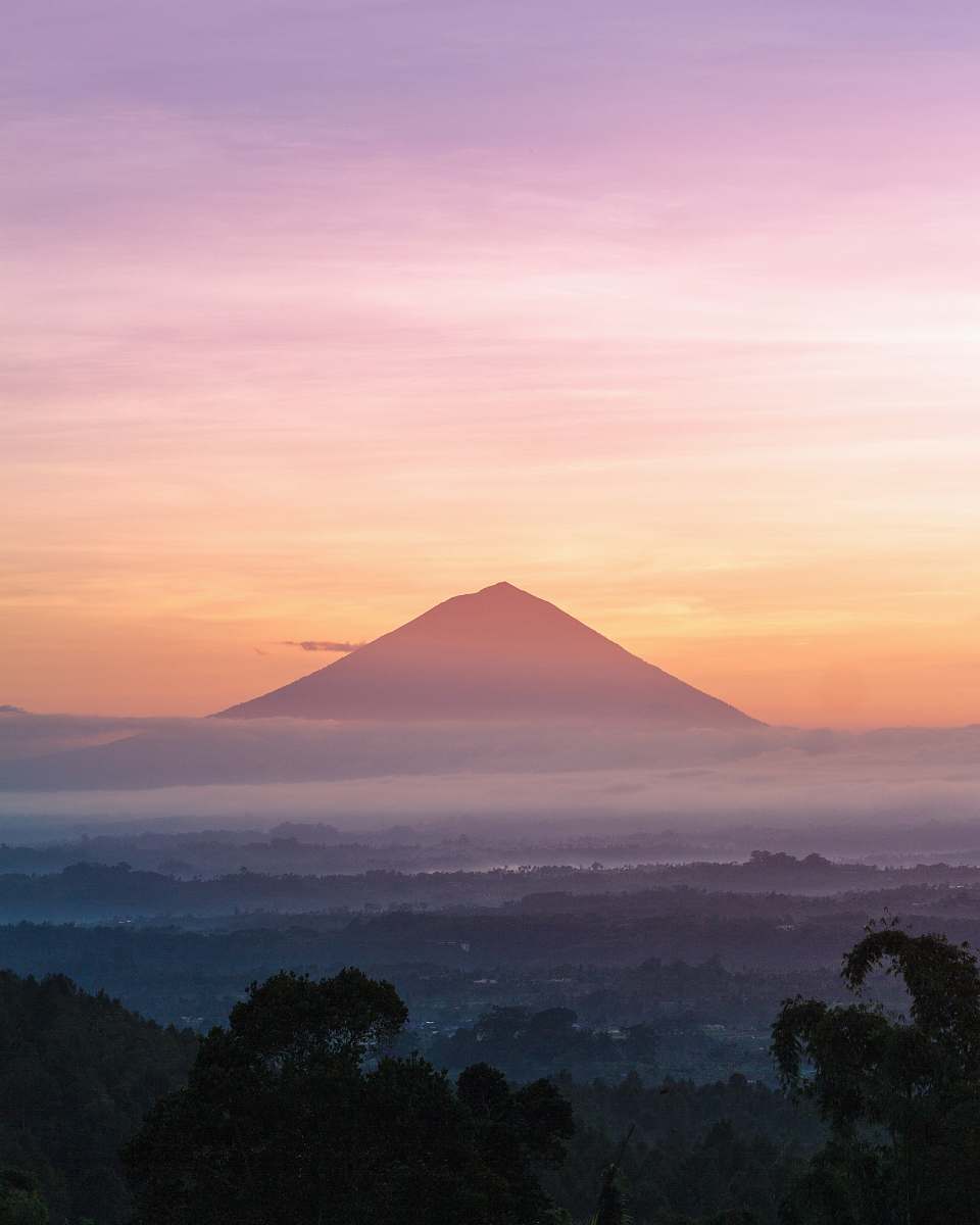 sunrise mountain under orange sky bali