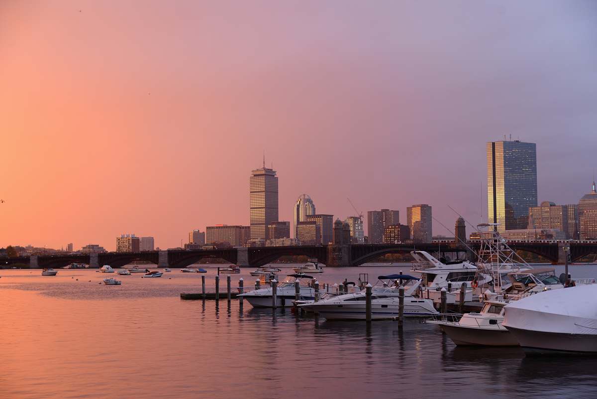  photo of city building near body of water 