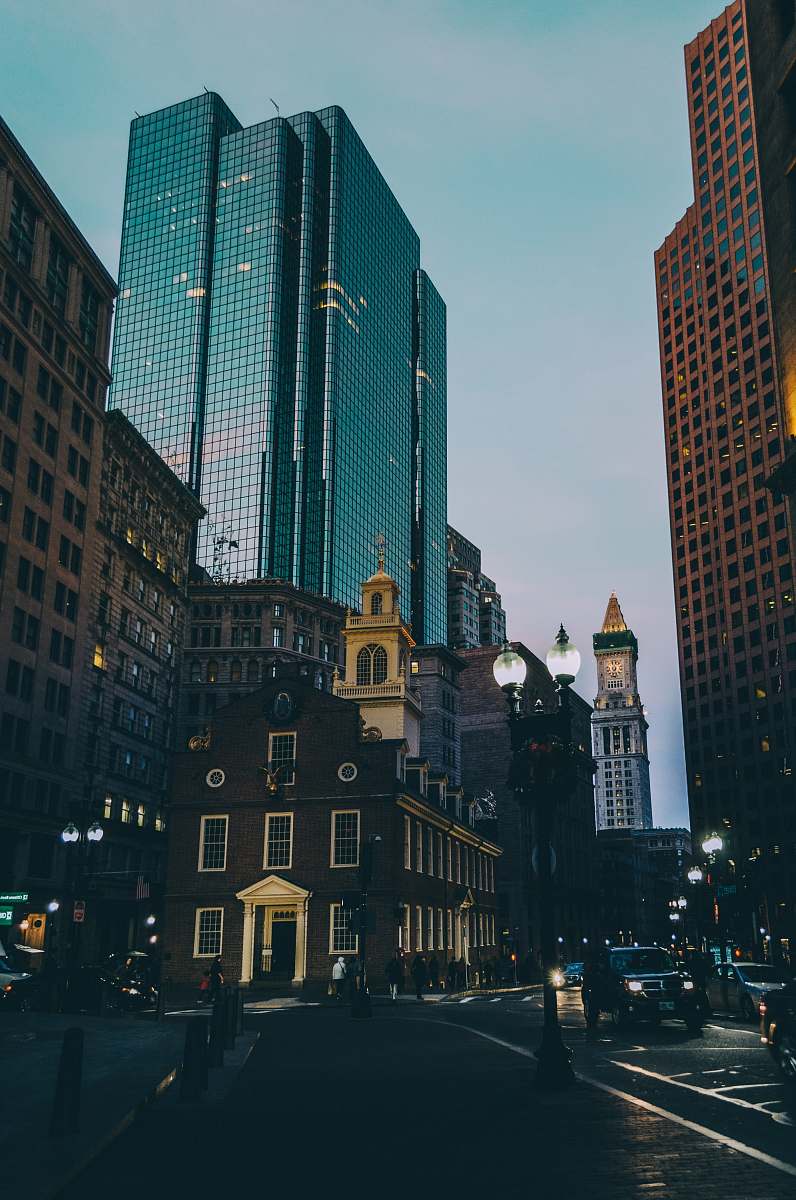 road black high buildings at nighttime urban