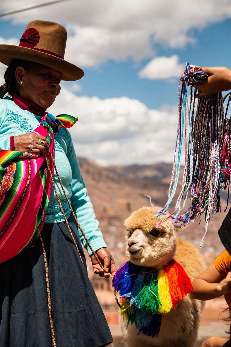 clothing woman standing near mascot hat