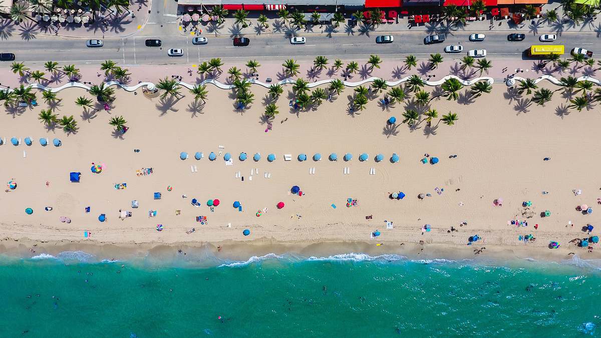 ocean aerial photography of coastline with people florida