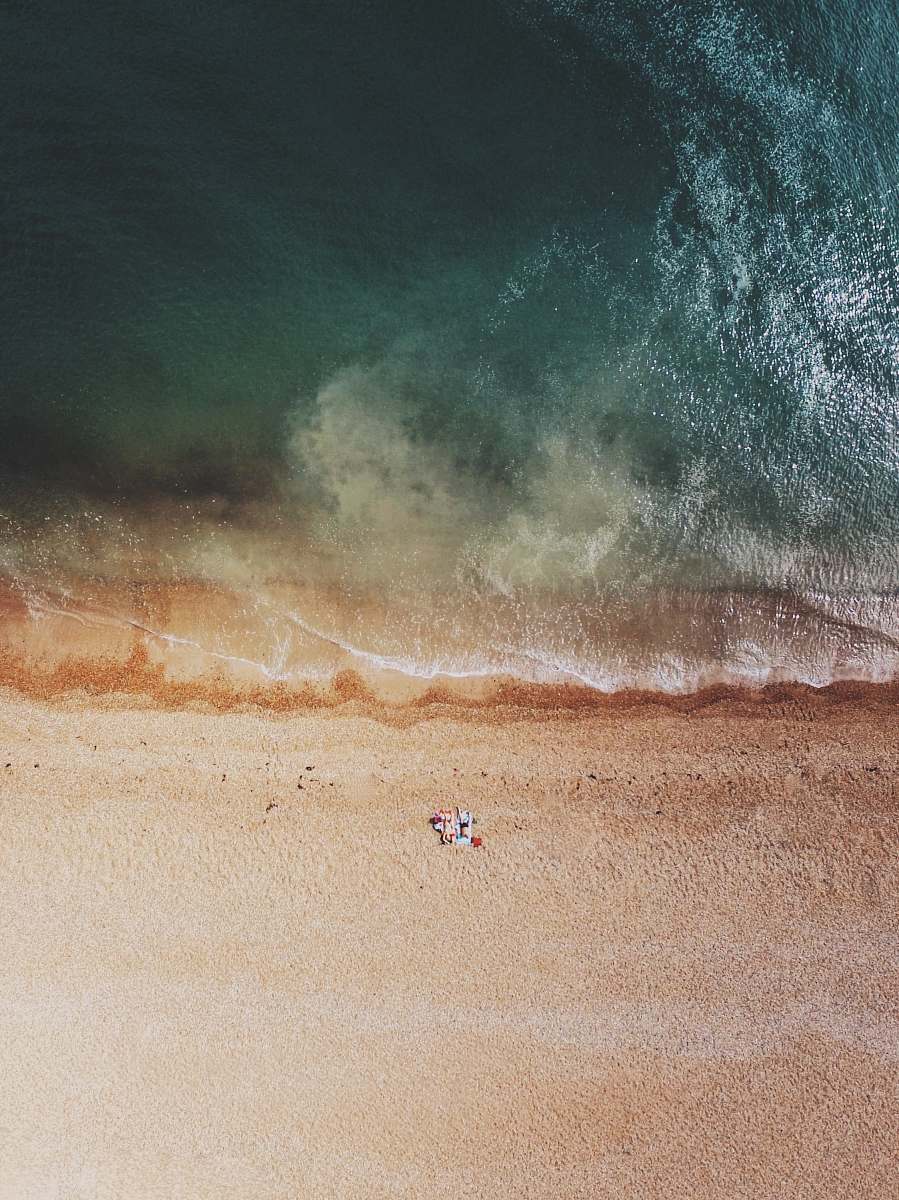 water aerial photography of shore sea