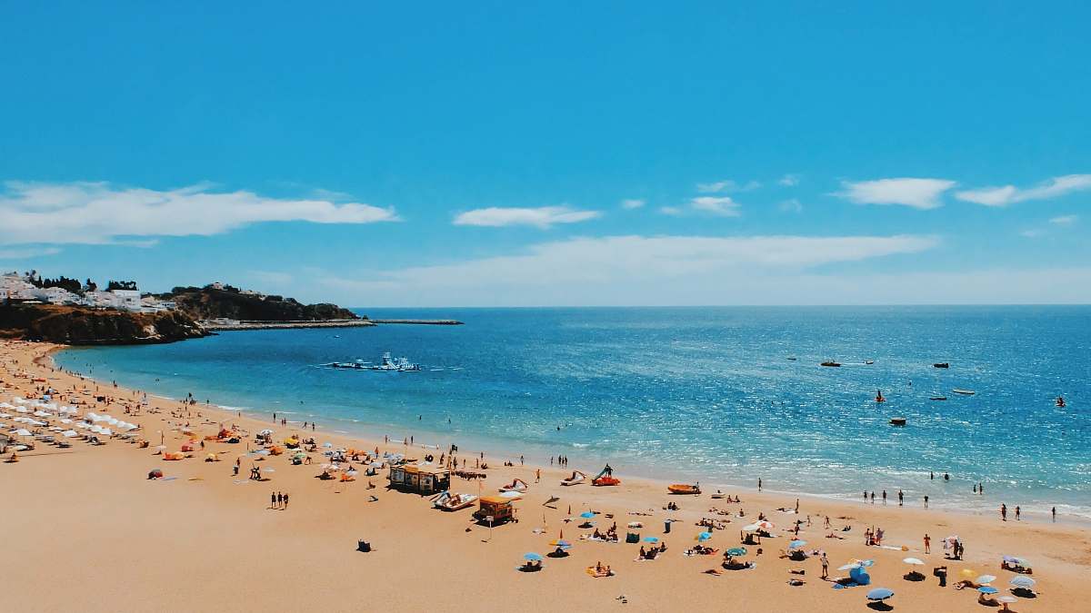 ocean people near seashore during daytime sea