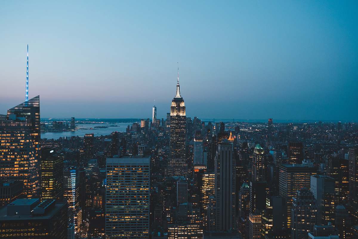 tower aerial view of city buildings during dusk steeple