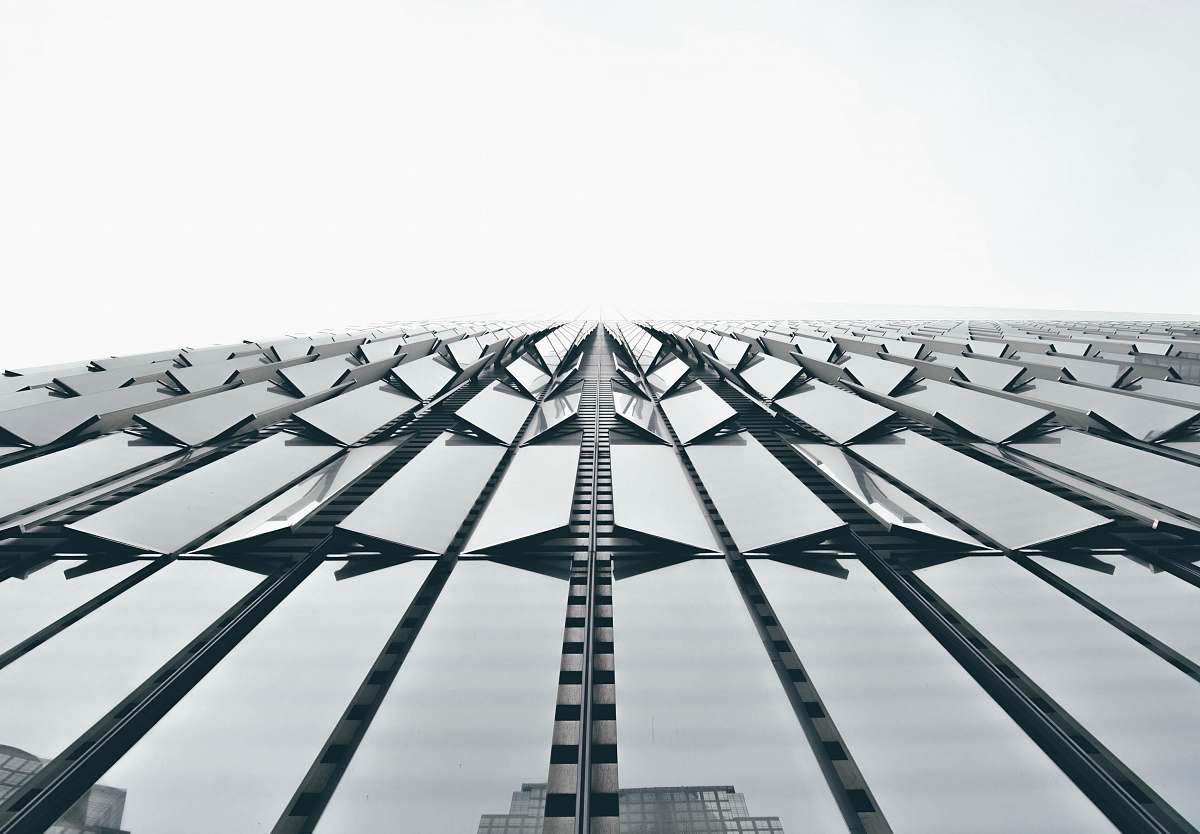 architecture low angle photography of clear glass architectural design skyscraper