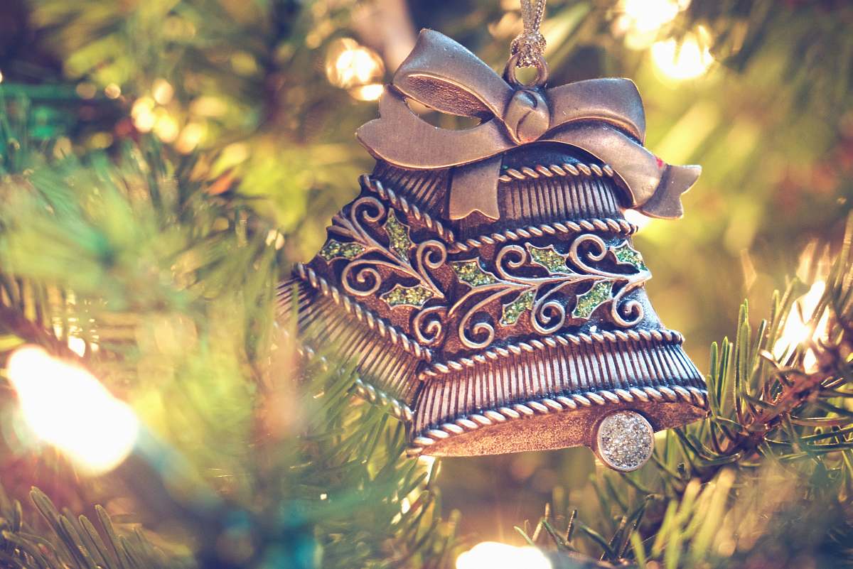 holiday brown bell hanging on christmas tree ornament