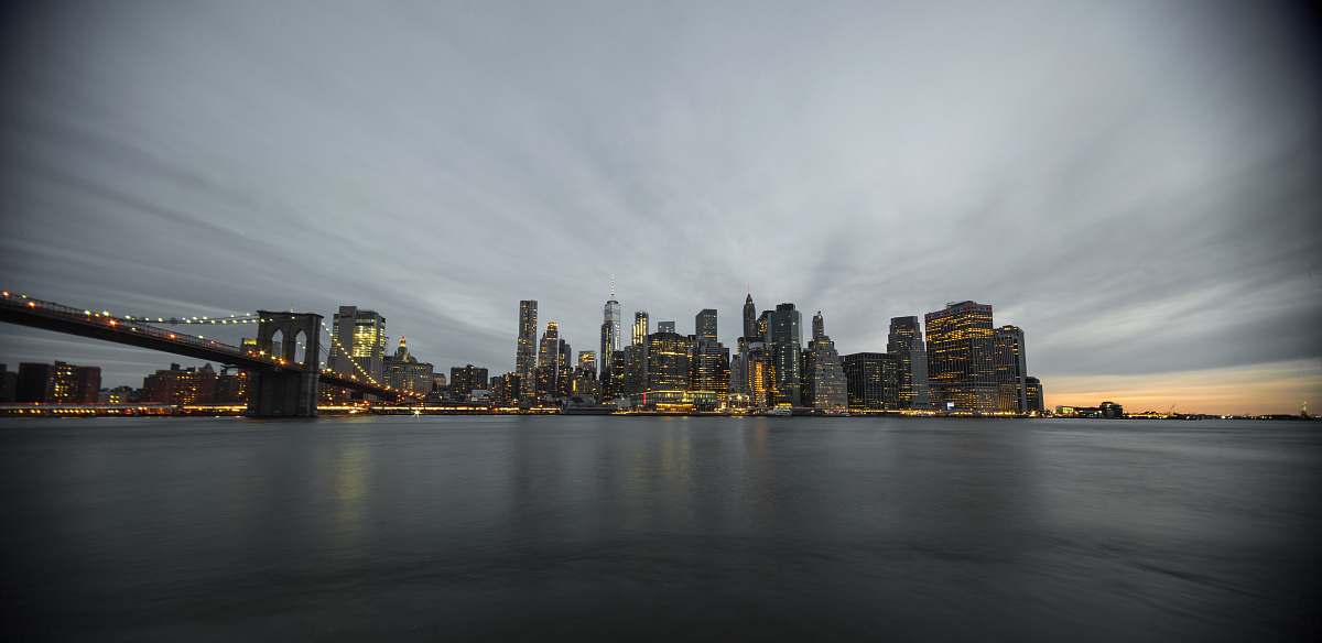 grey photography of buildings brooklyn bridge park