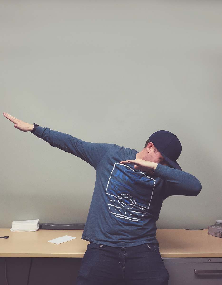 apparel dubbing man in blue sweater sleeve