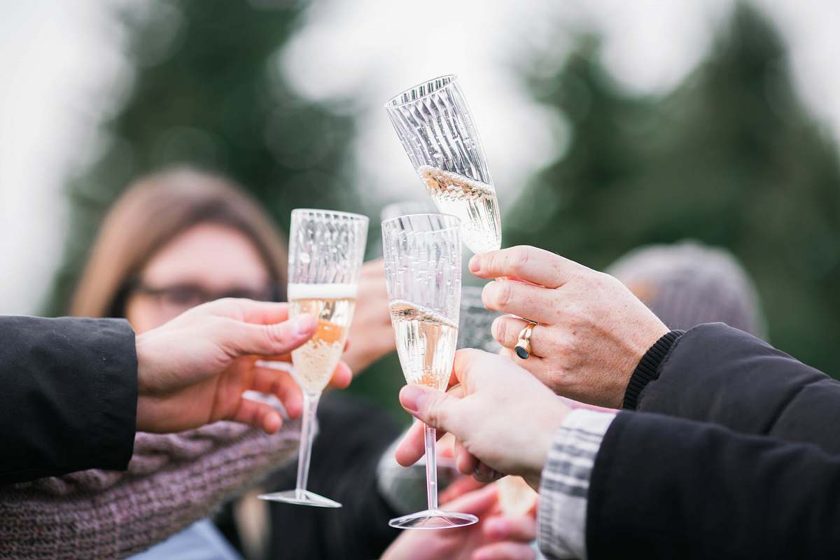 wedding people holding clear champagne glasses ontario
