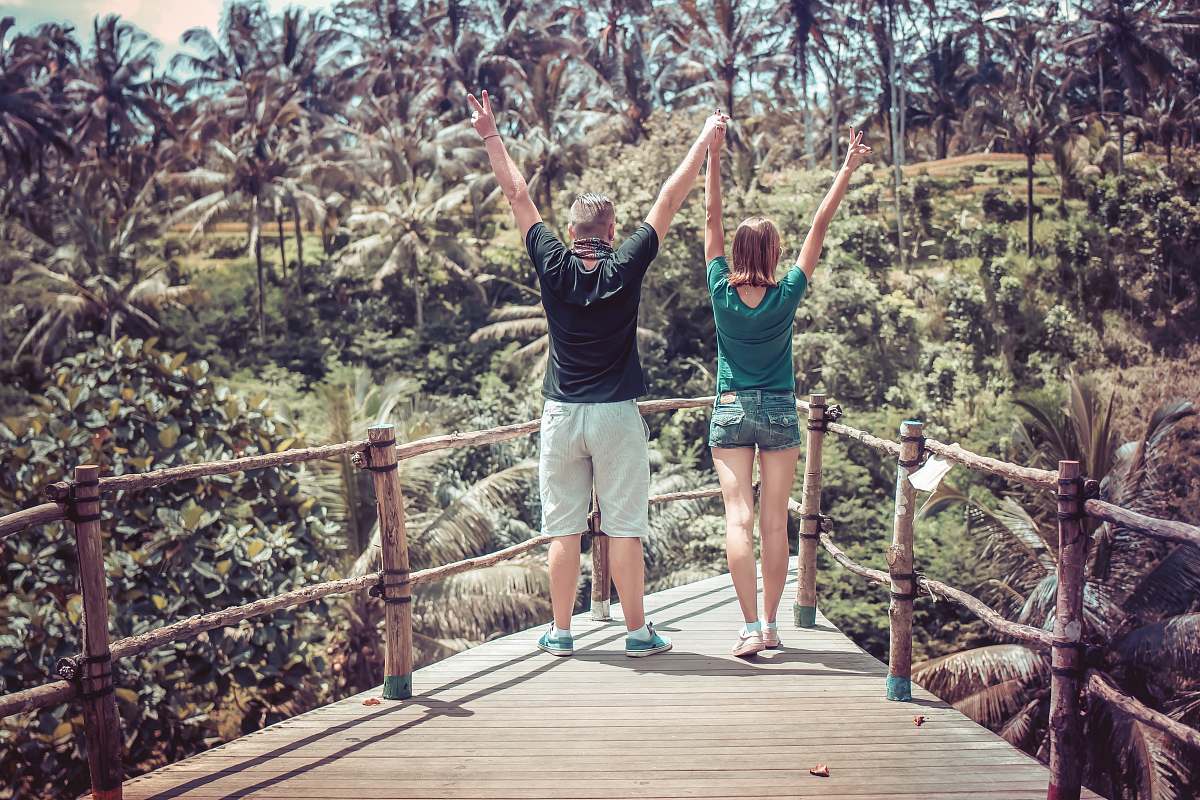 person man and woman raising their hands people