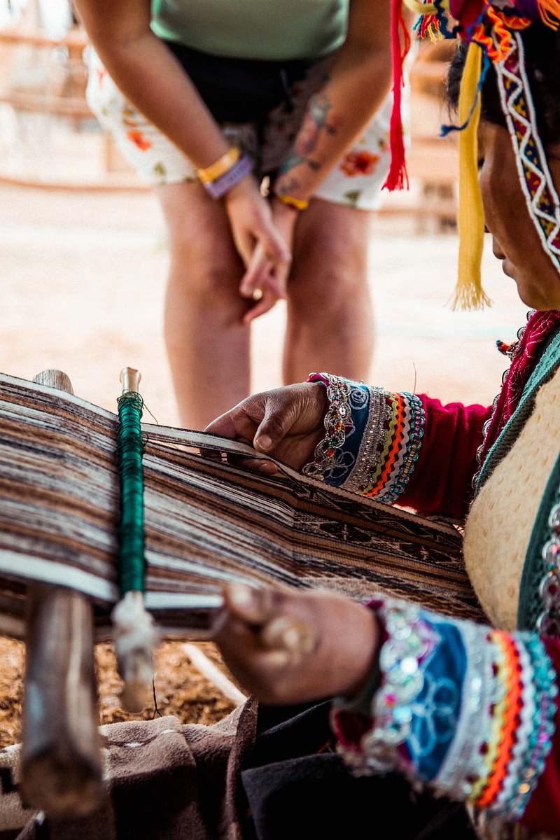 person person holding textile cusco