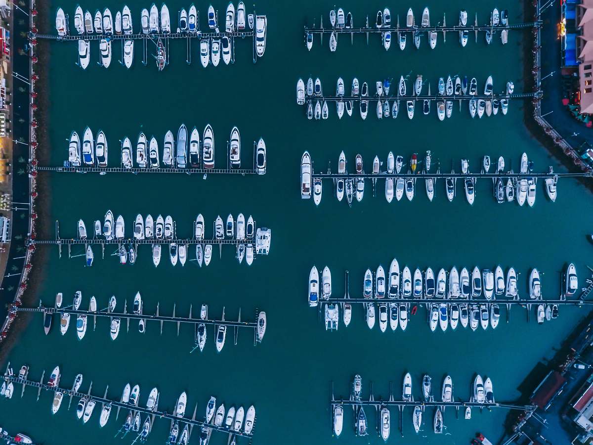 portugal white boats on body of water at daytime drone view