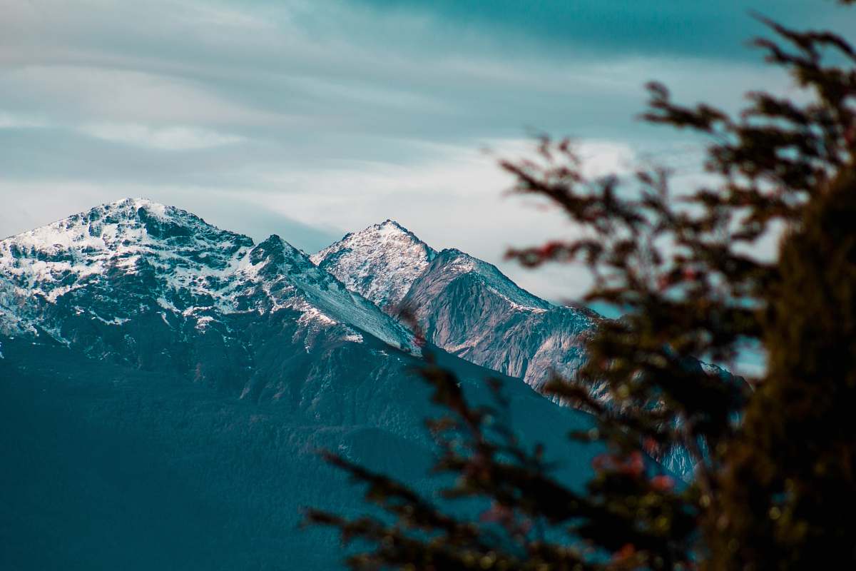 nature white glacier mountain during day time mountain range