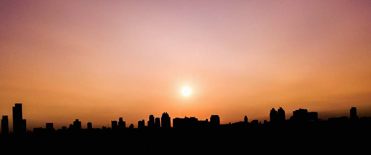 outdoors silhouette photography of building during sunset silhouette