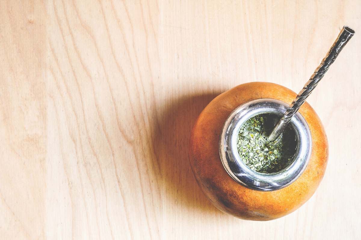 wood brown and gray cup on wooden board smoke pipe