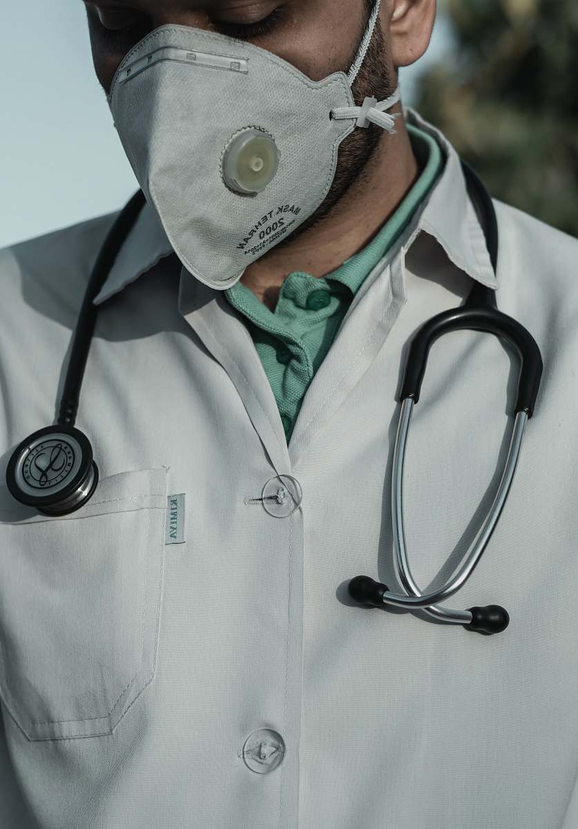 apparel person in white and black stethoscope clothing