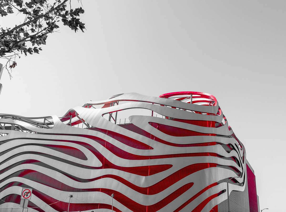 red photo of white and red structure during day time clothing