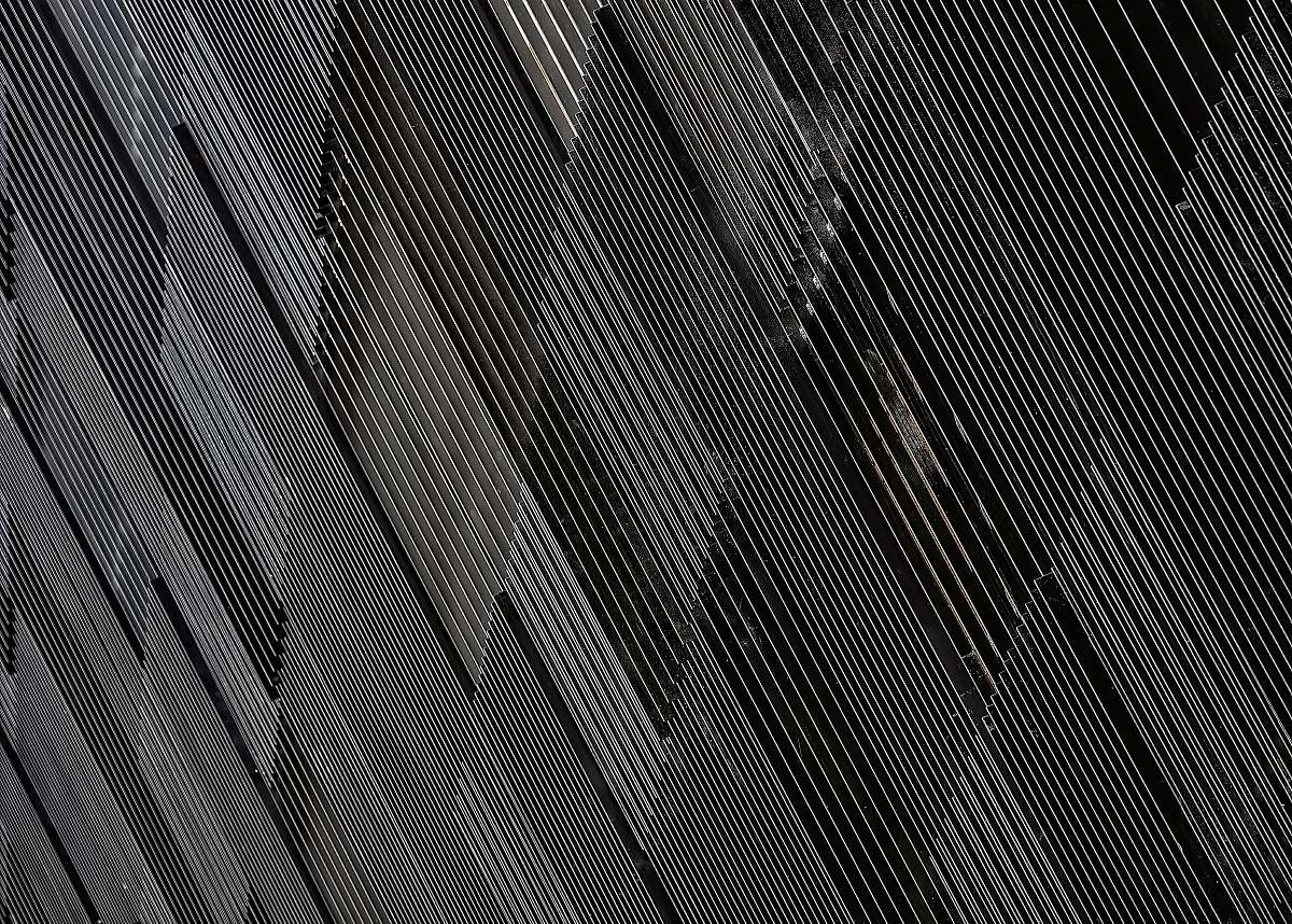building close-up photograph of black concrete wall city