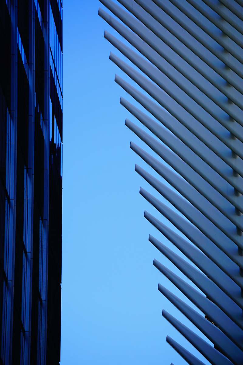 blue architectural photography of white and blue building new york