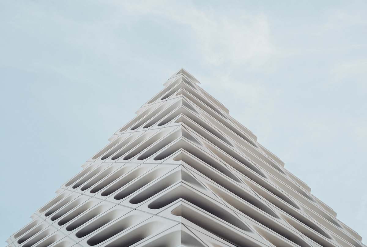 architecture low angle photography of building grey