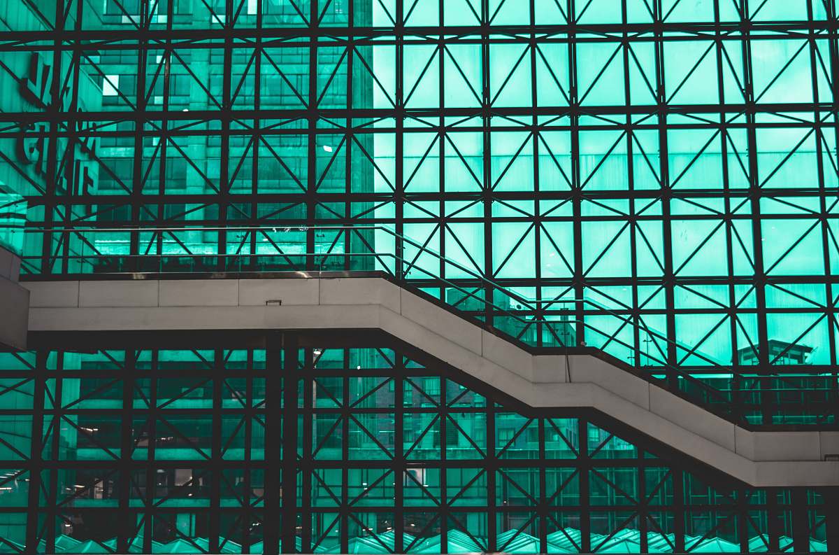 staircase photography of white bridge in building repetition