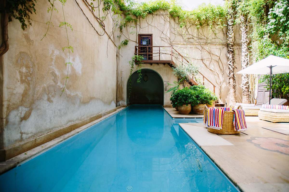 hotel swimming pool photo during daytime pool