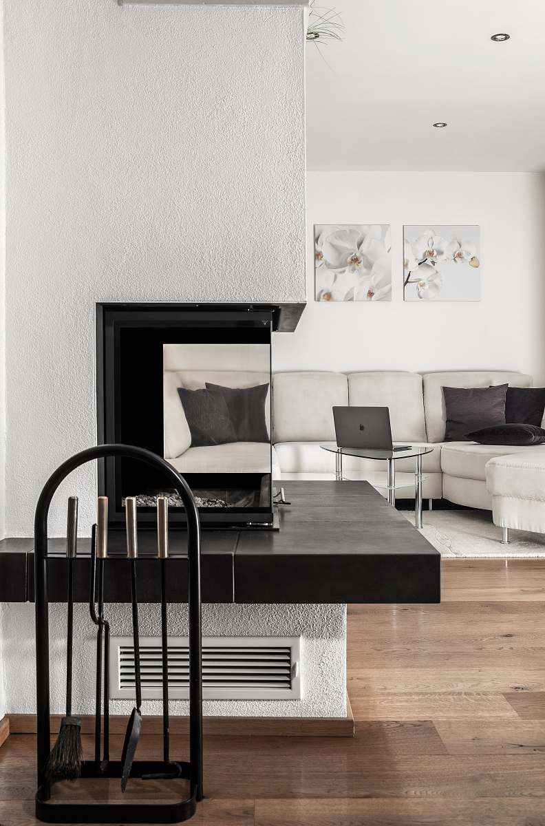 interior white sectional sofa and black table furniture