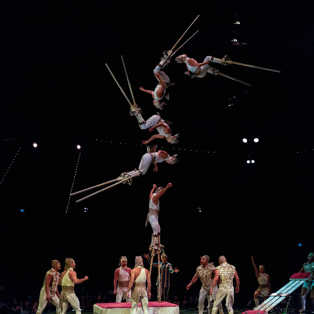 human acrobat taking stunts person