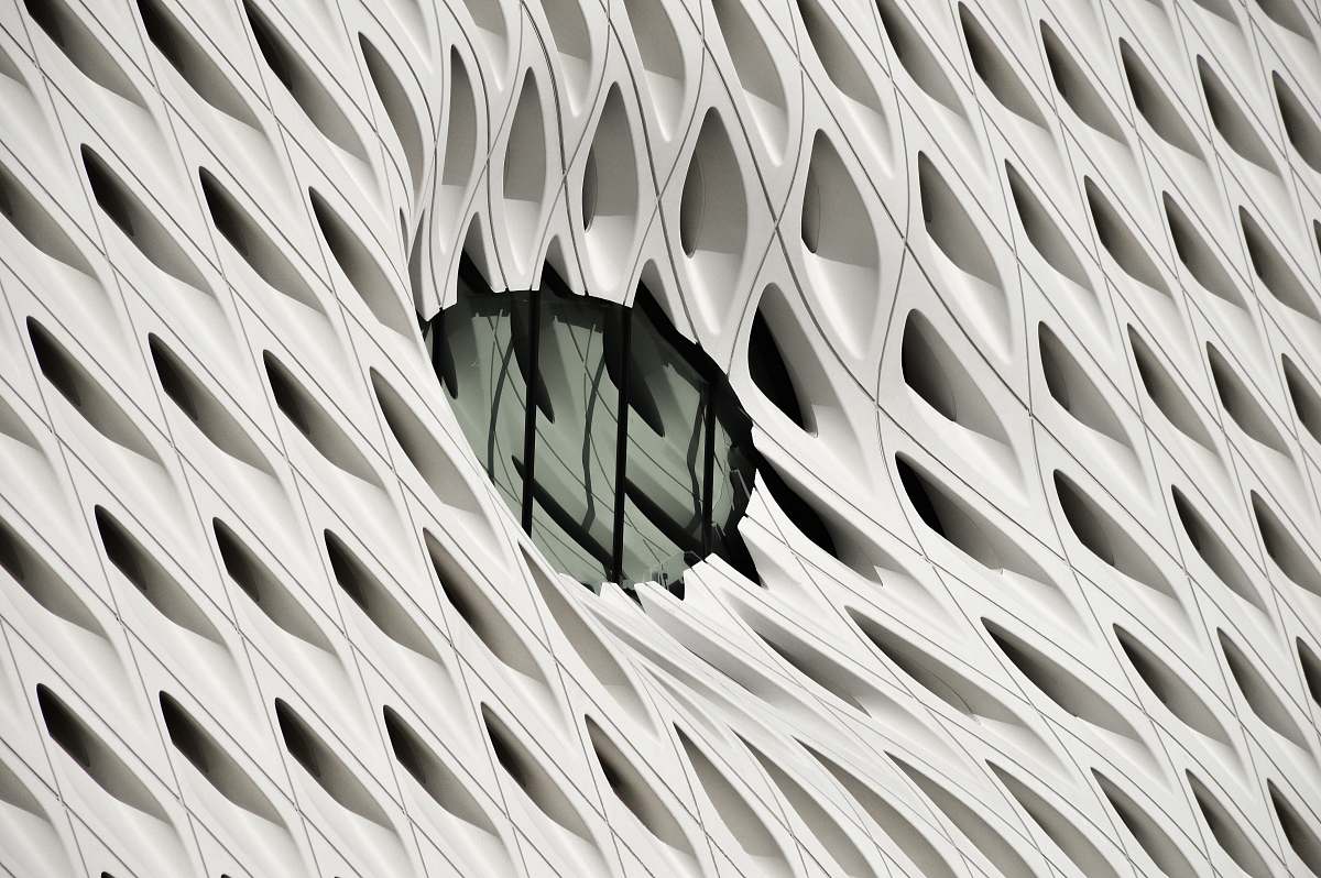 architecture oval black tint glass panel on white surface los angeles
