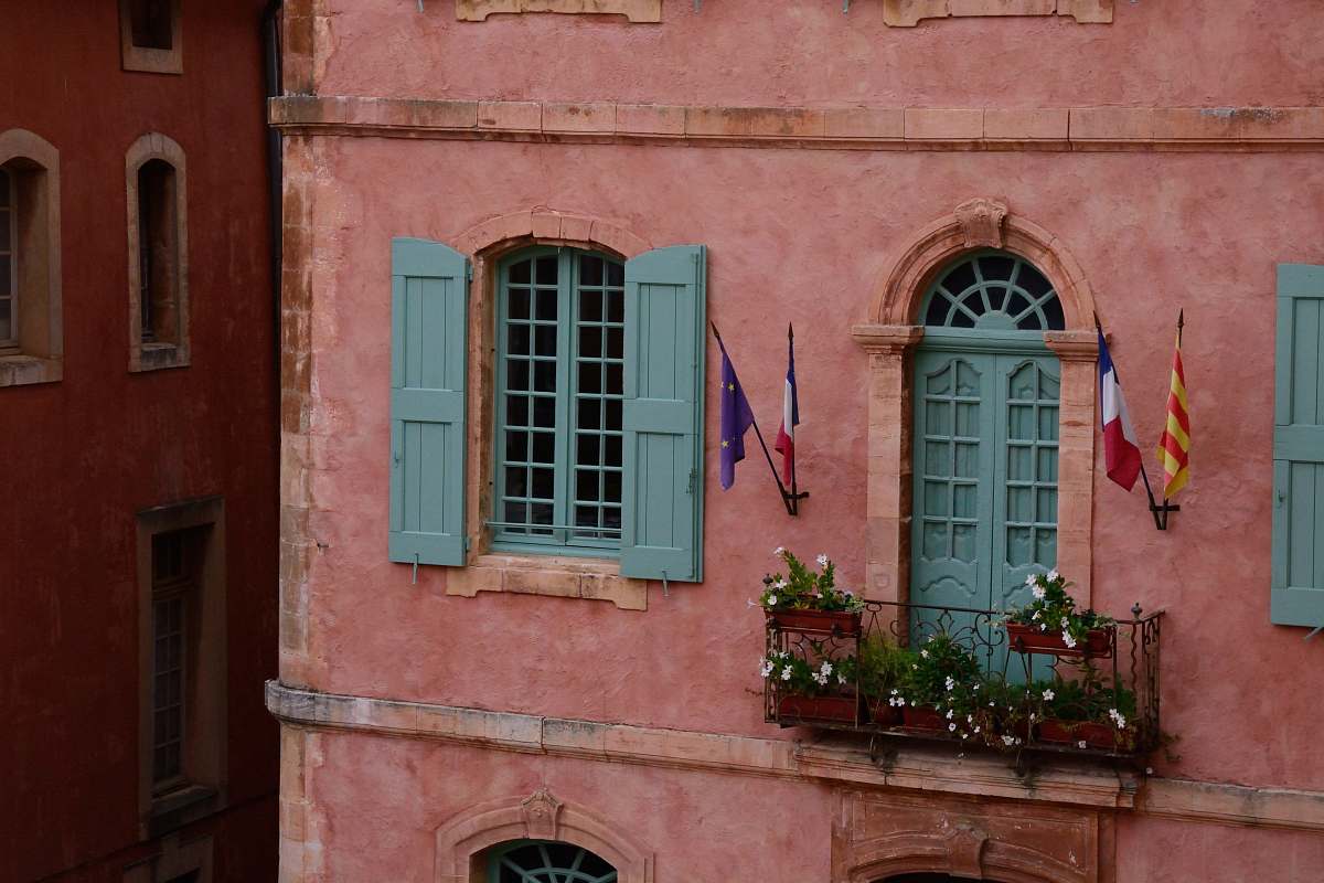 jar architectural photography of pink and blue concrete building pottery
