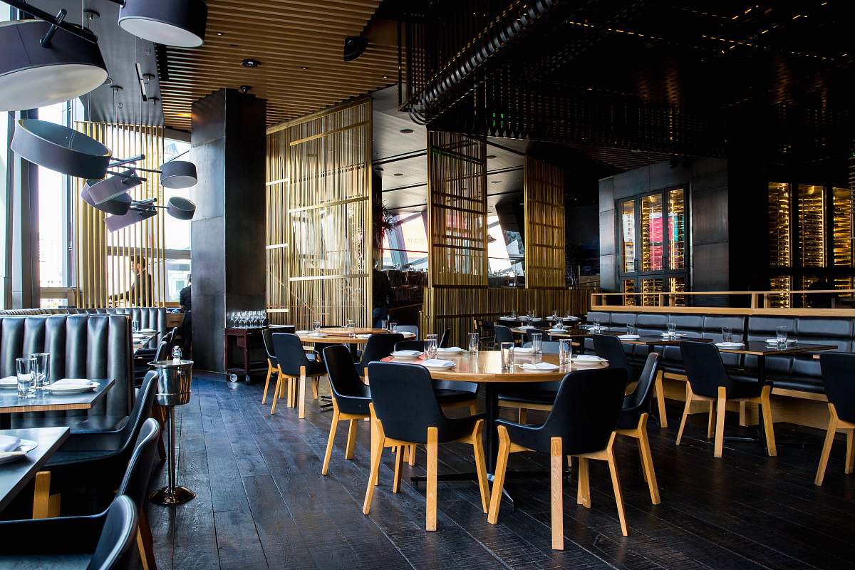 chair photo of pub set in room during daytime restaurant