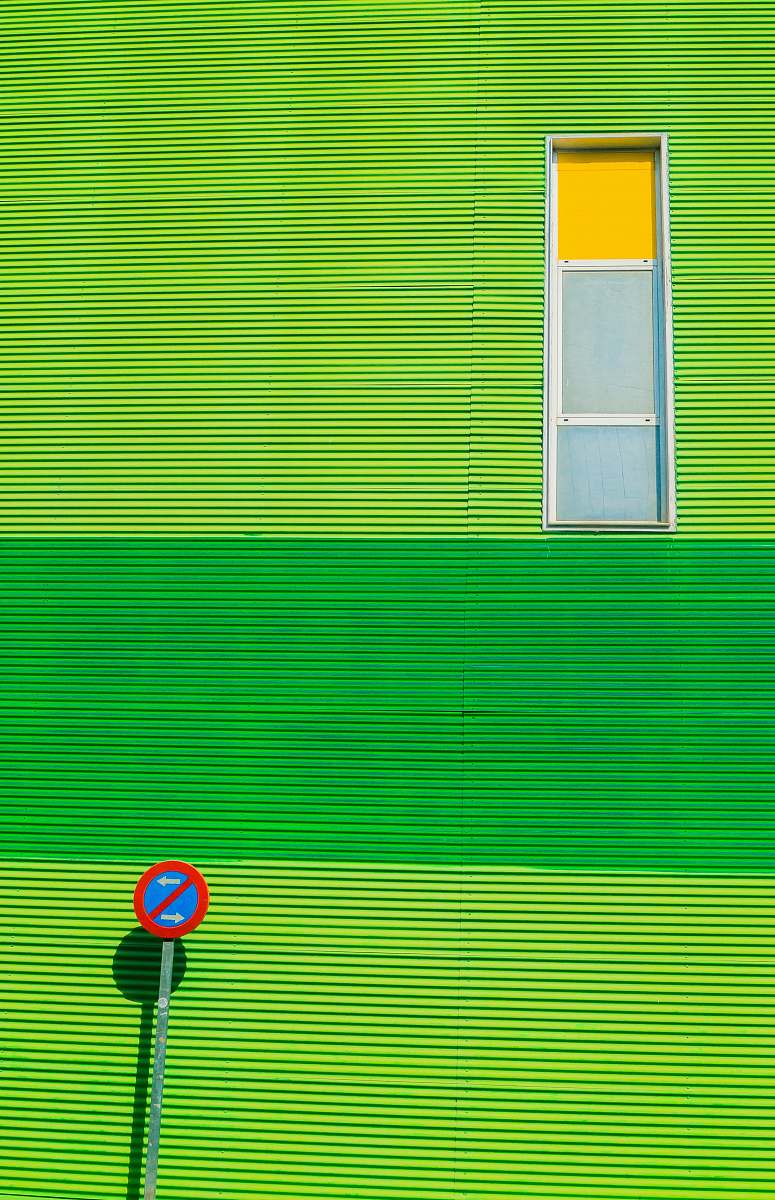 wall green house with road sign window