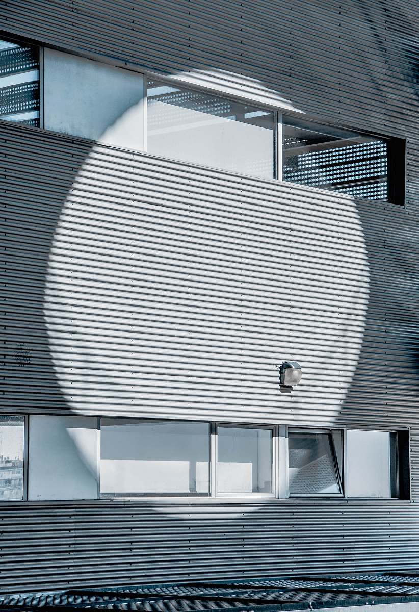 building gray painted building wall lines