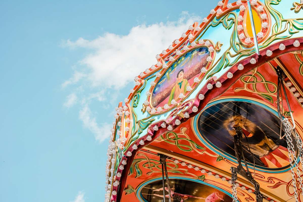 carnival multicolored amusement ride crowd