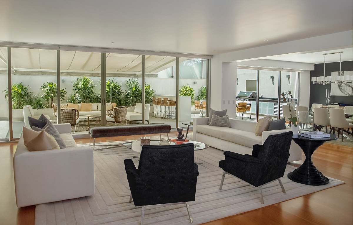 home two black suede armchairs during daytime furniture