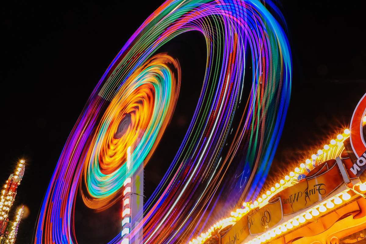 circle time lapse photography of Ferris wheel spin