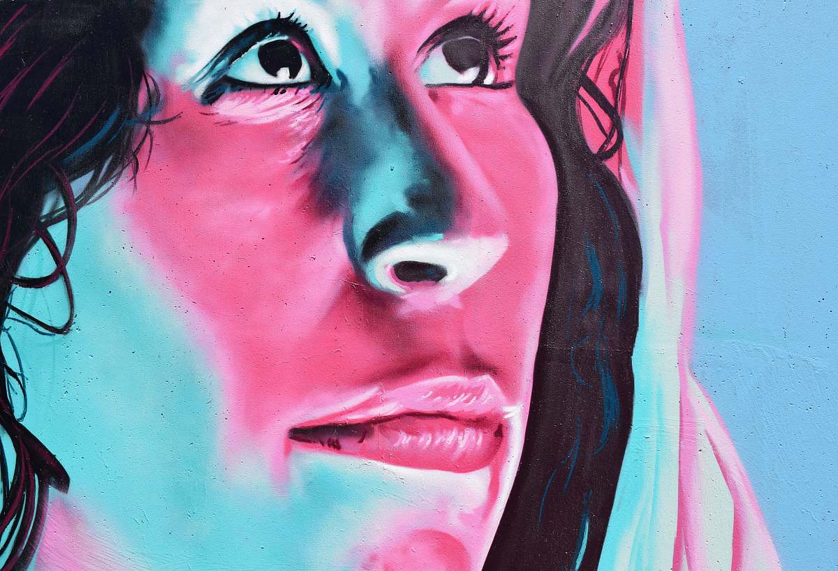 human close view of woman's face painting art
