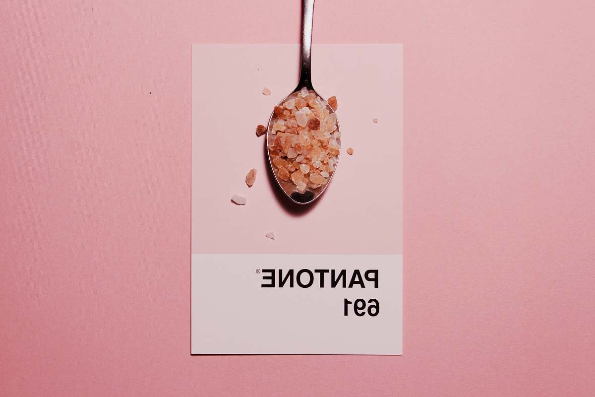 spoon silver spoon with Pantone 691 text overlay color