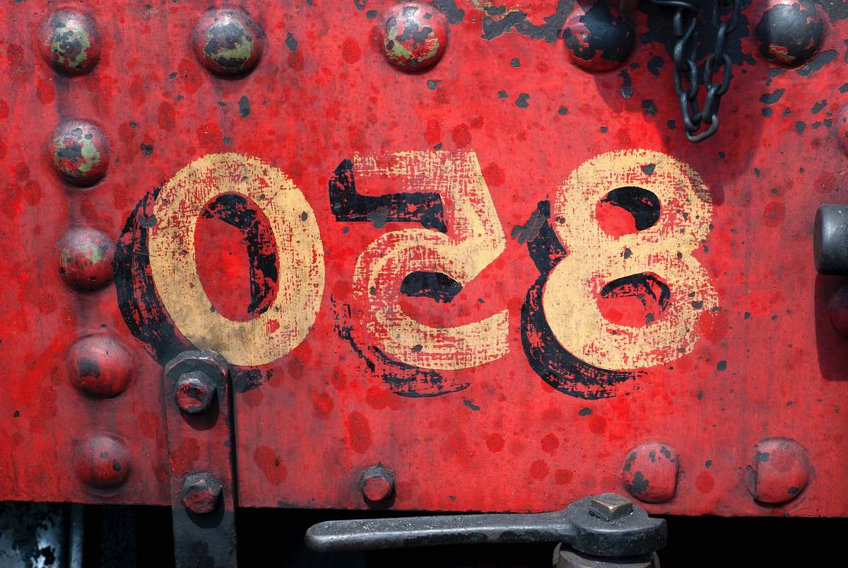 numbers 850-printed on red metal panel united kingdom