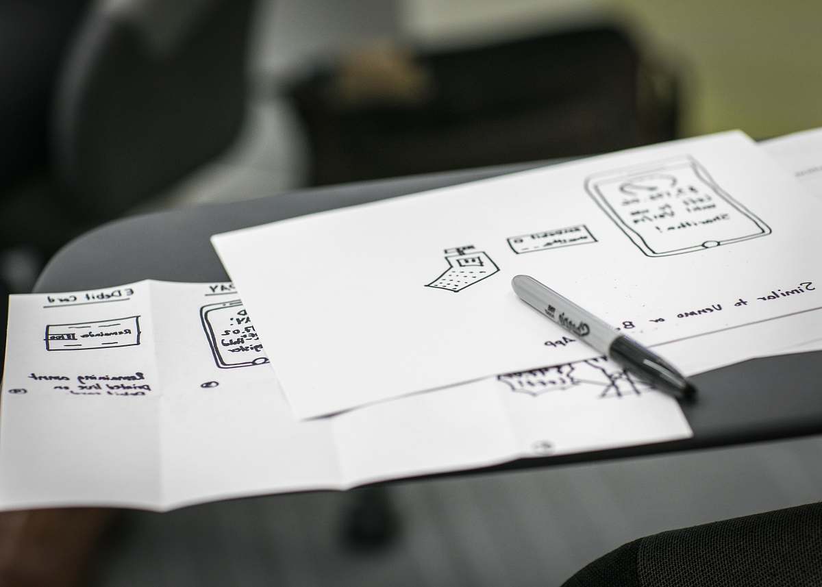 sketching black marker on white printer papers design