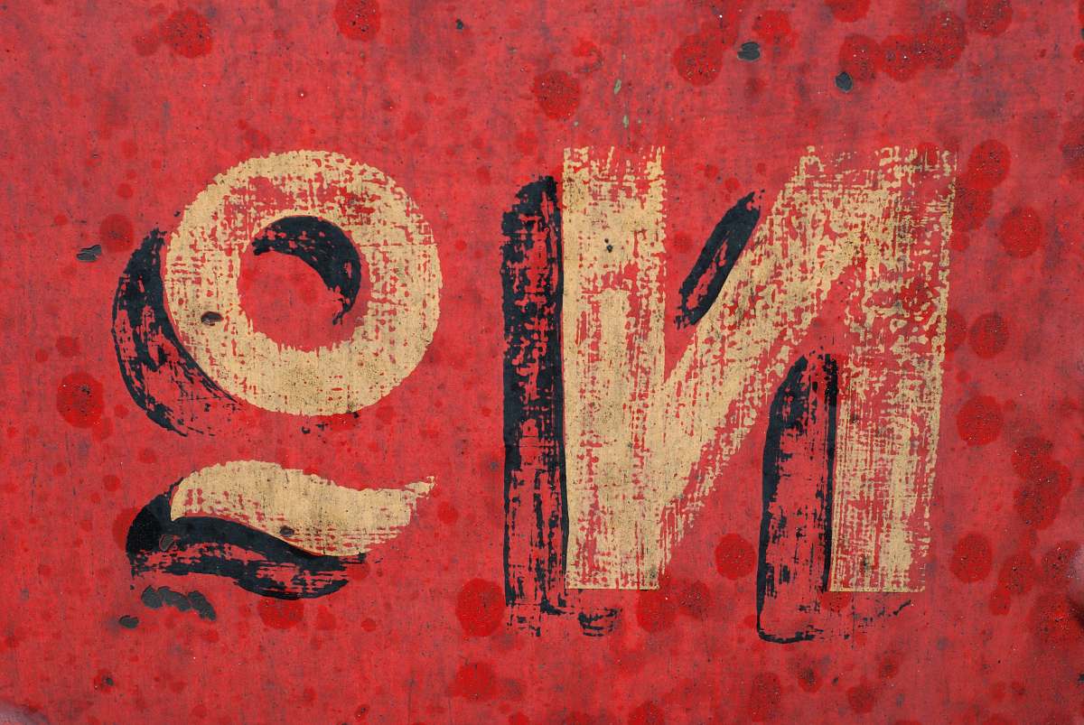 red No text overlay on red background typography