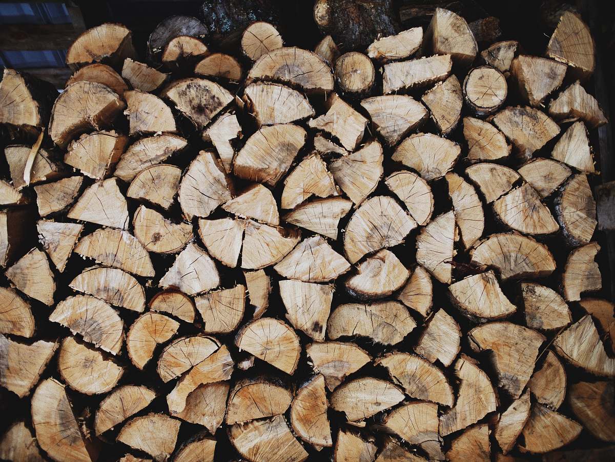 woodpile pile of brown log log