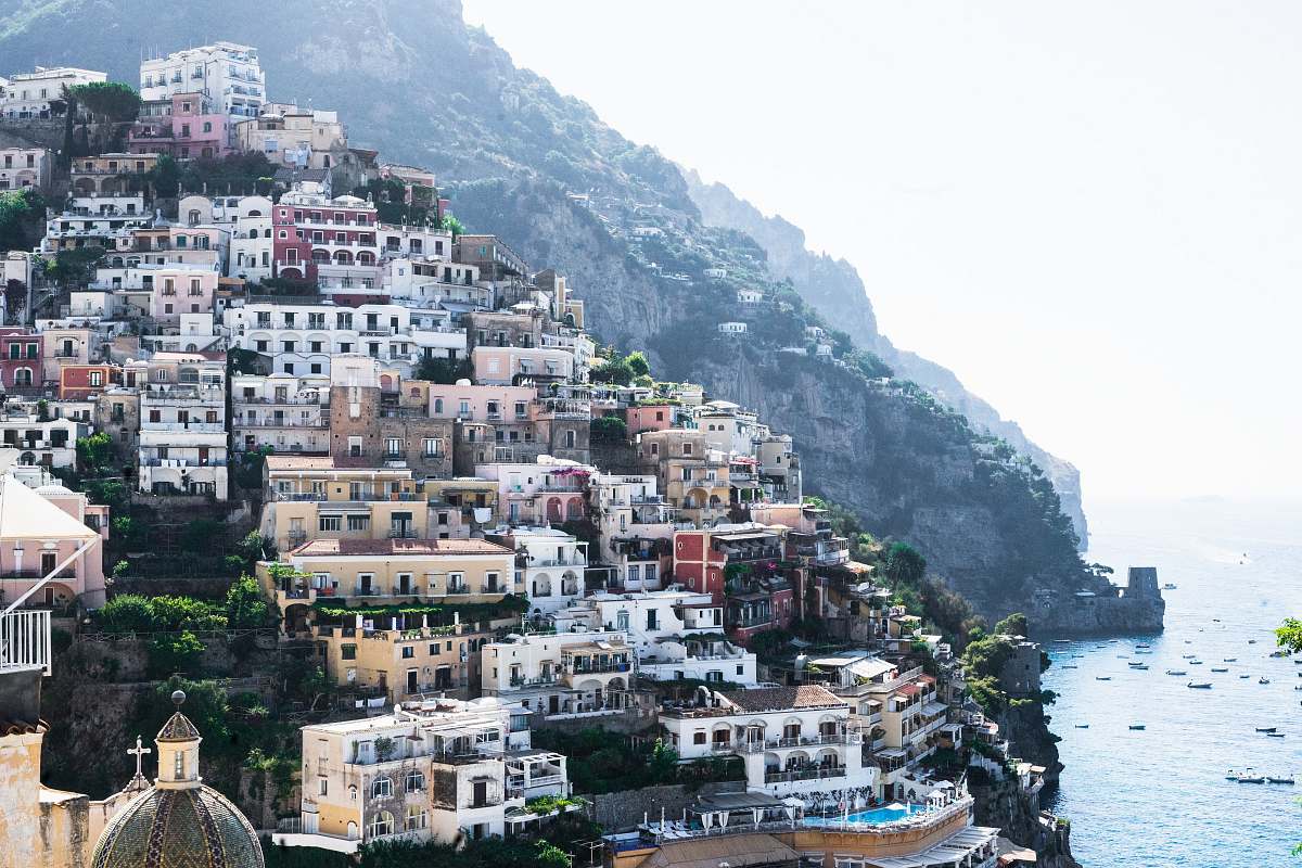 town photo of houses near ocean during daytime positano
