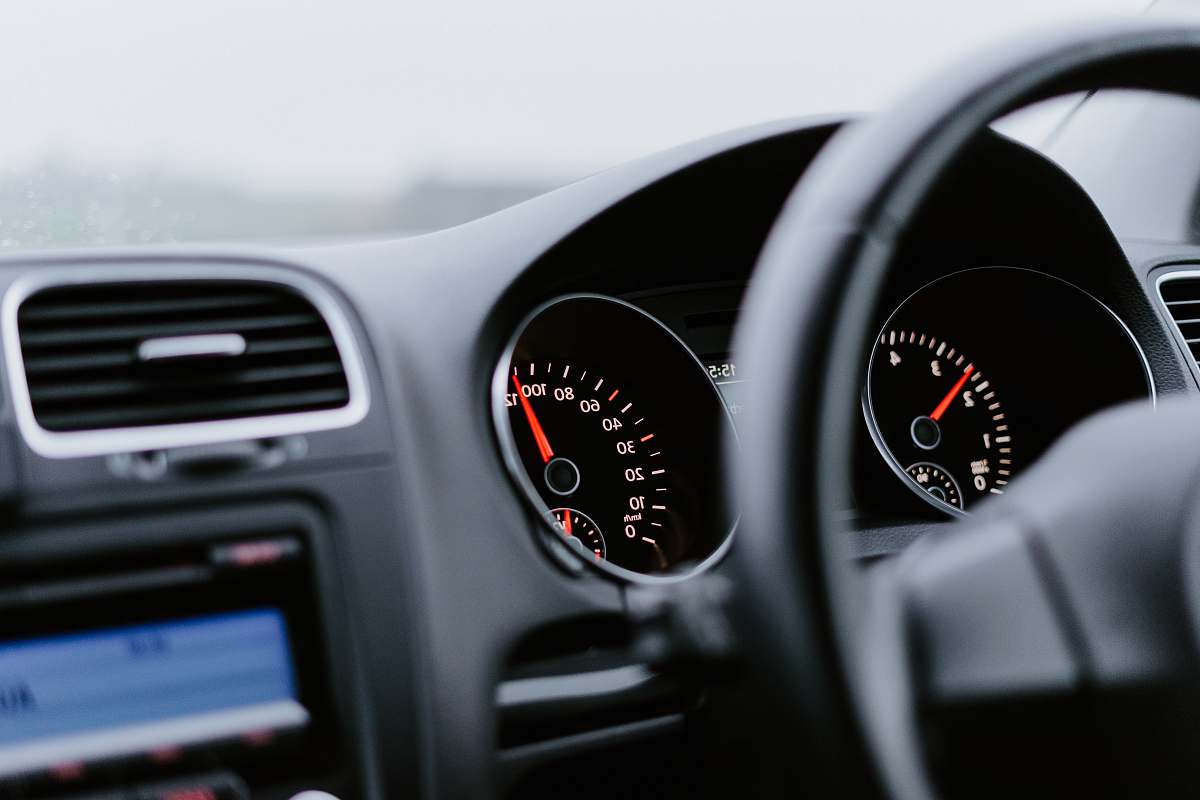 automobile black vehicle dashboard with speedometer on 100 transportation