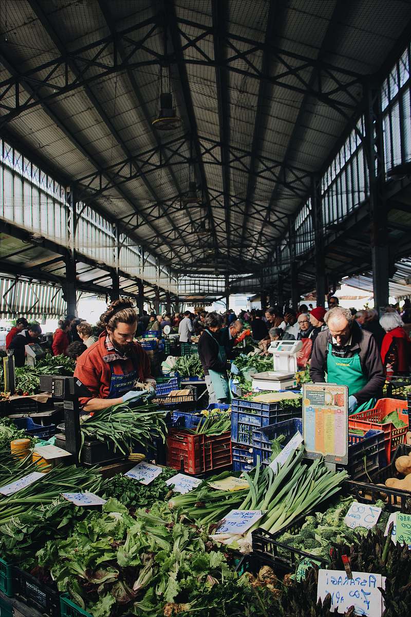 human man sitting near the vegetable person
