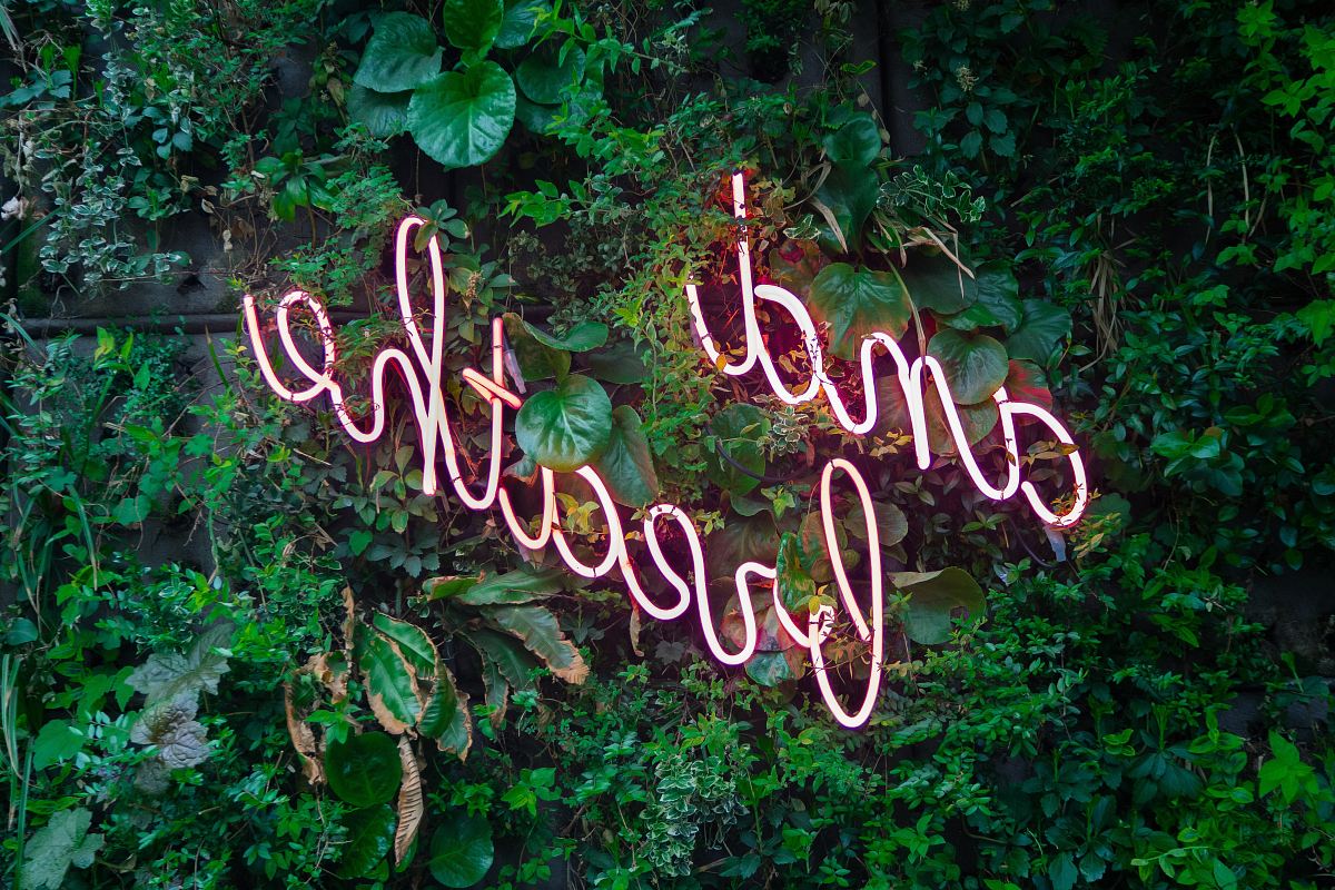 and breathe neon sign on tre
