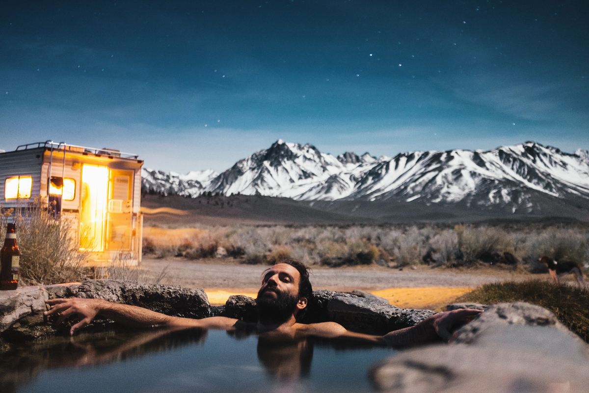 man swimming in spring