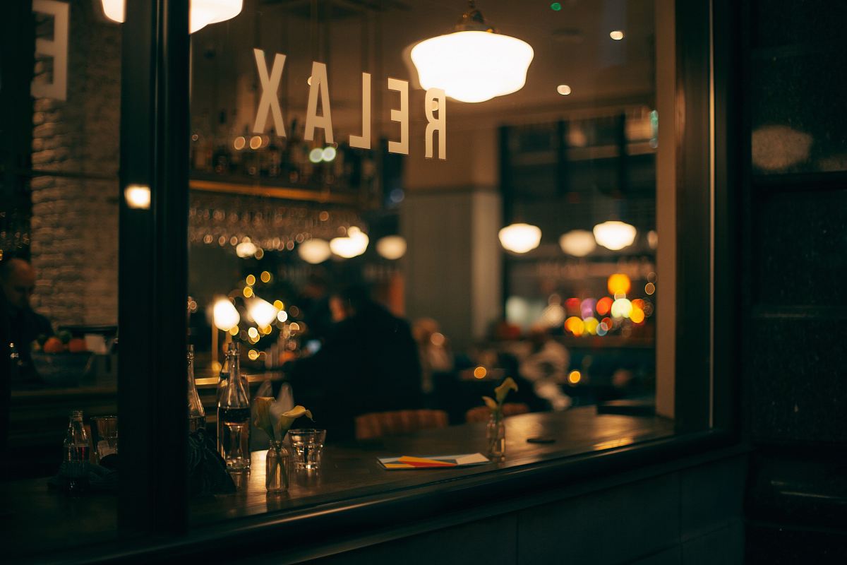 person sitting inside restaurant